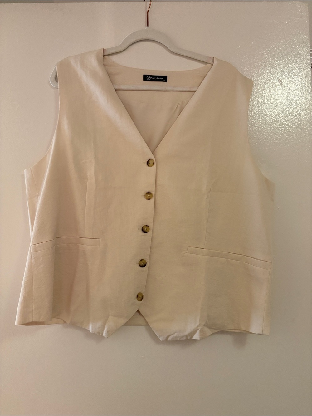 Women’s cream button up vest